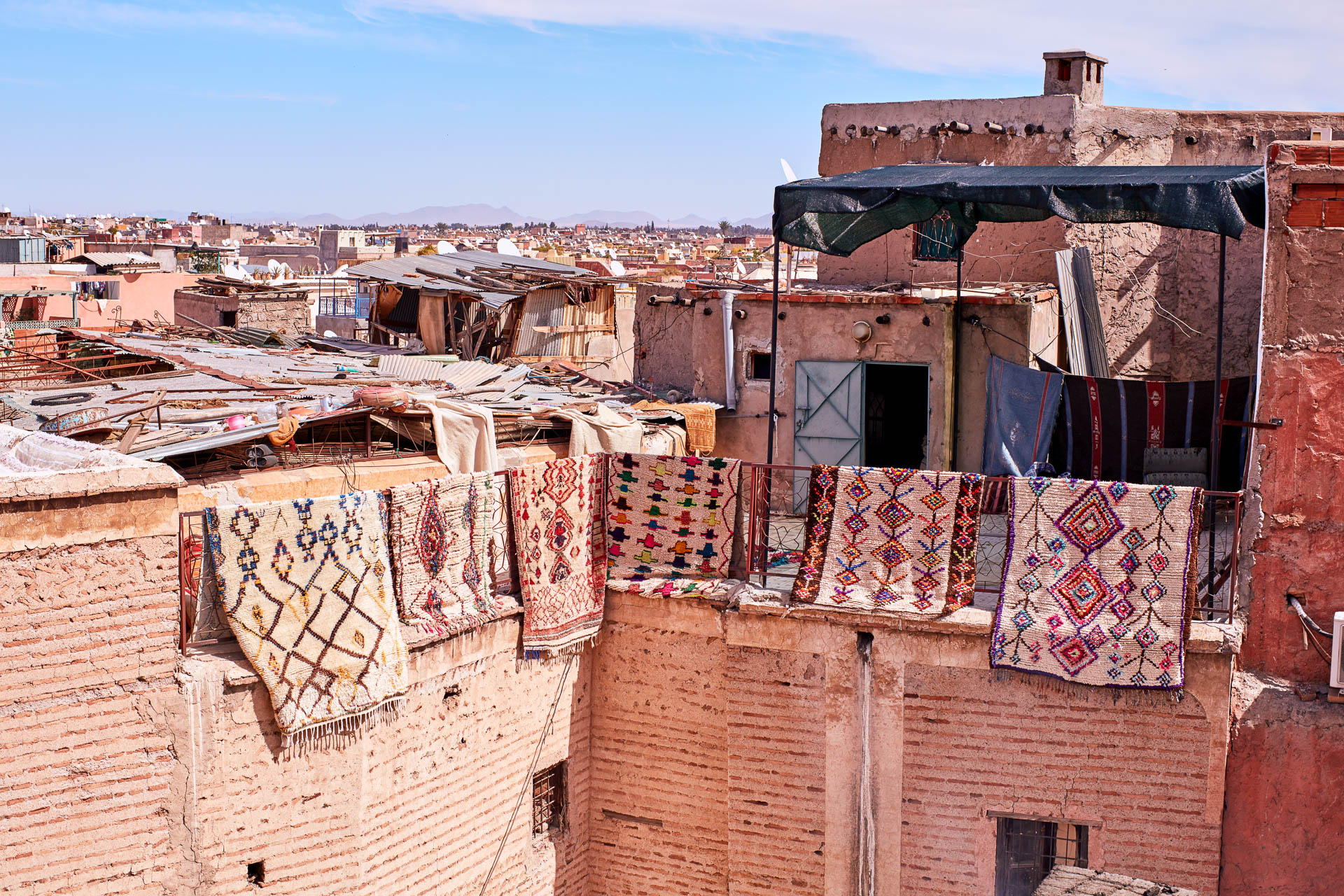 Carpets hanging from a roof in the Medina Marrakech
